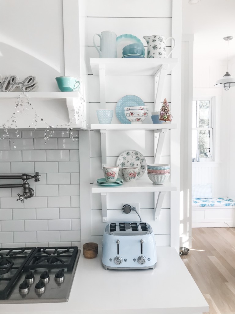 pottery and dishes on open shelves