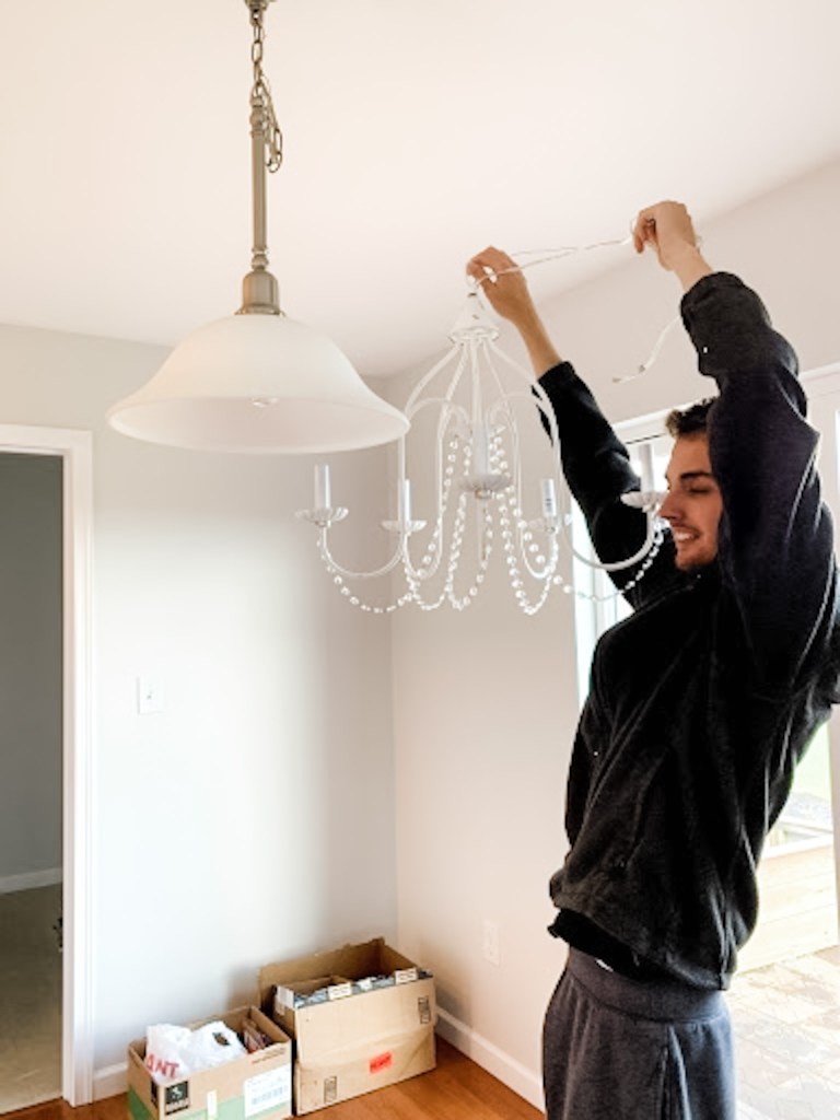Corey hanging new chandelier