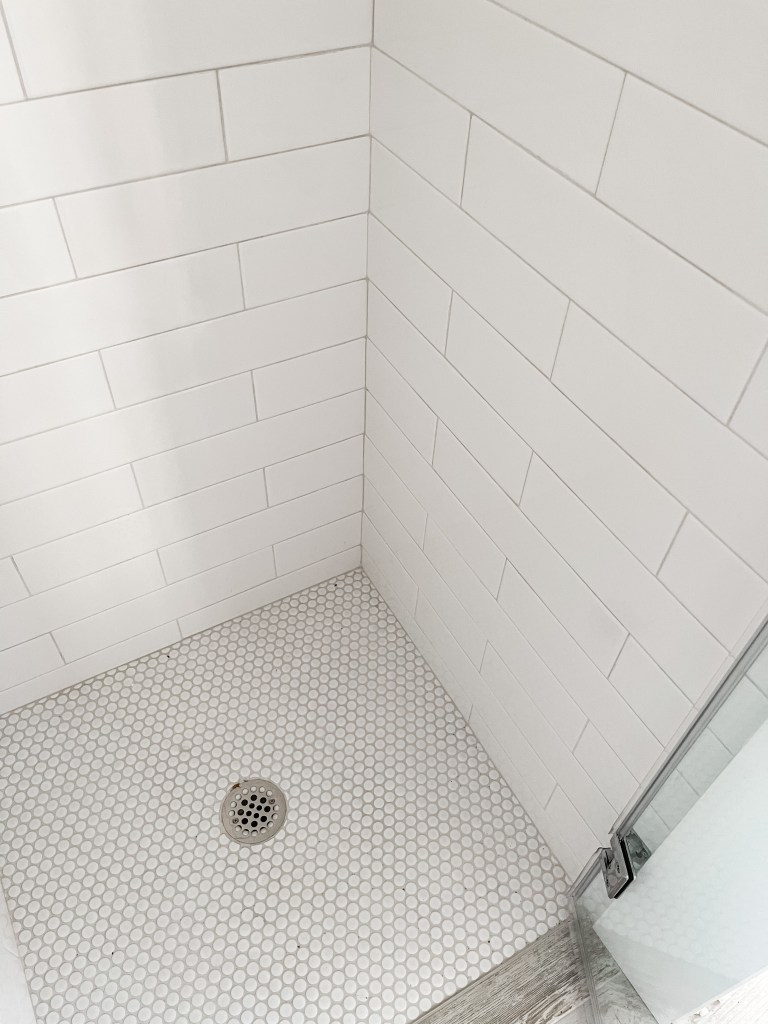 white subway tile shower