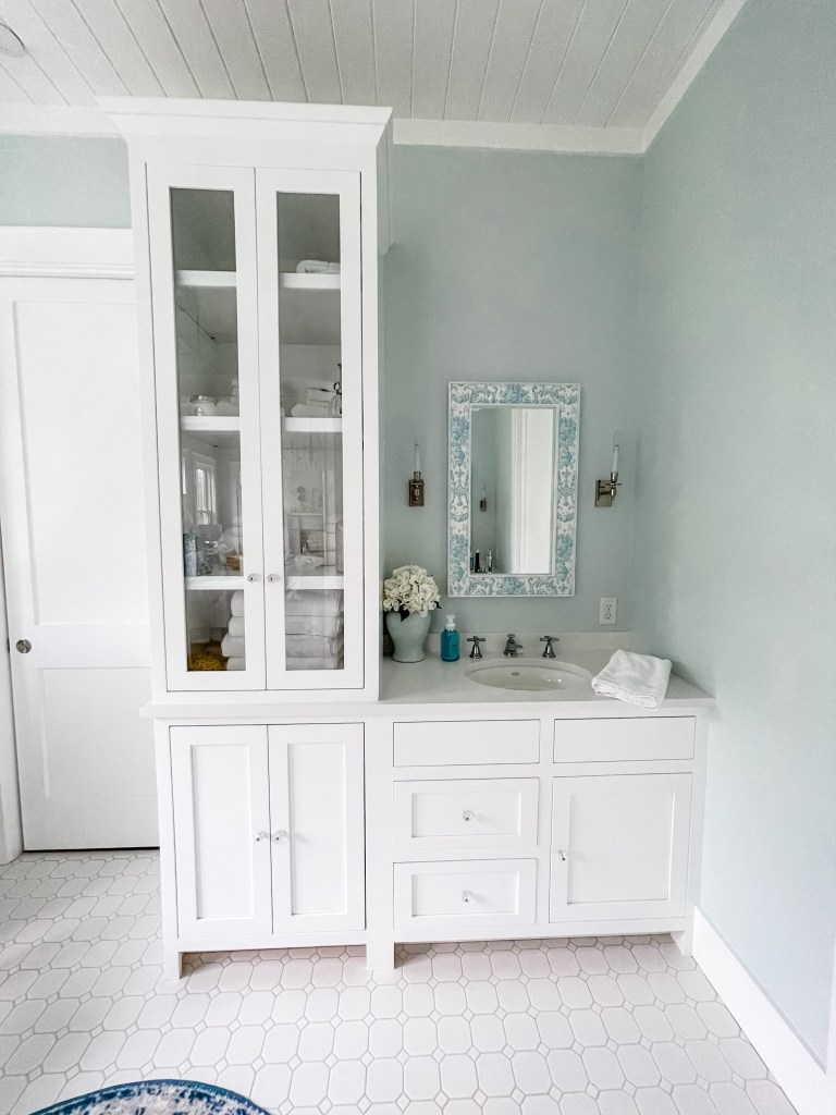 bathroom vanity with linen closet