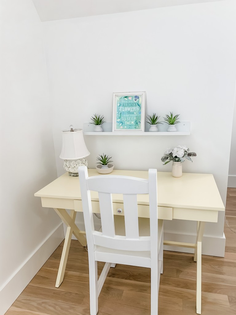 yellow desk with green flowers