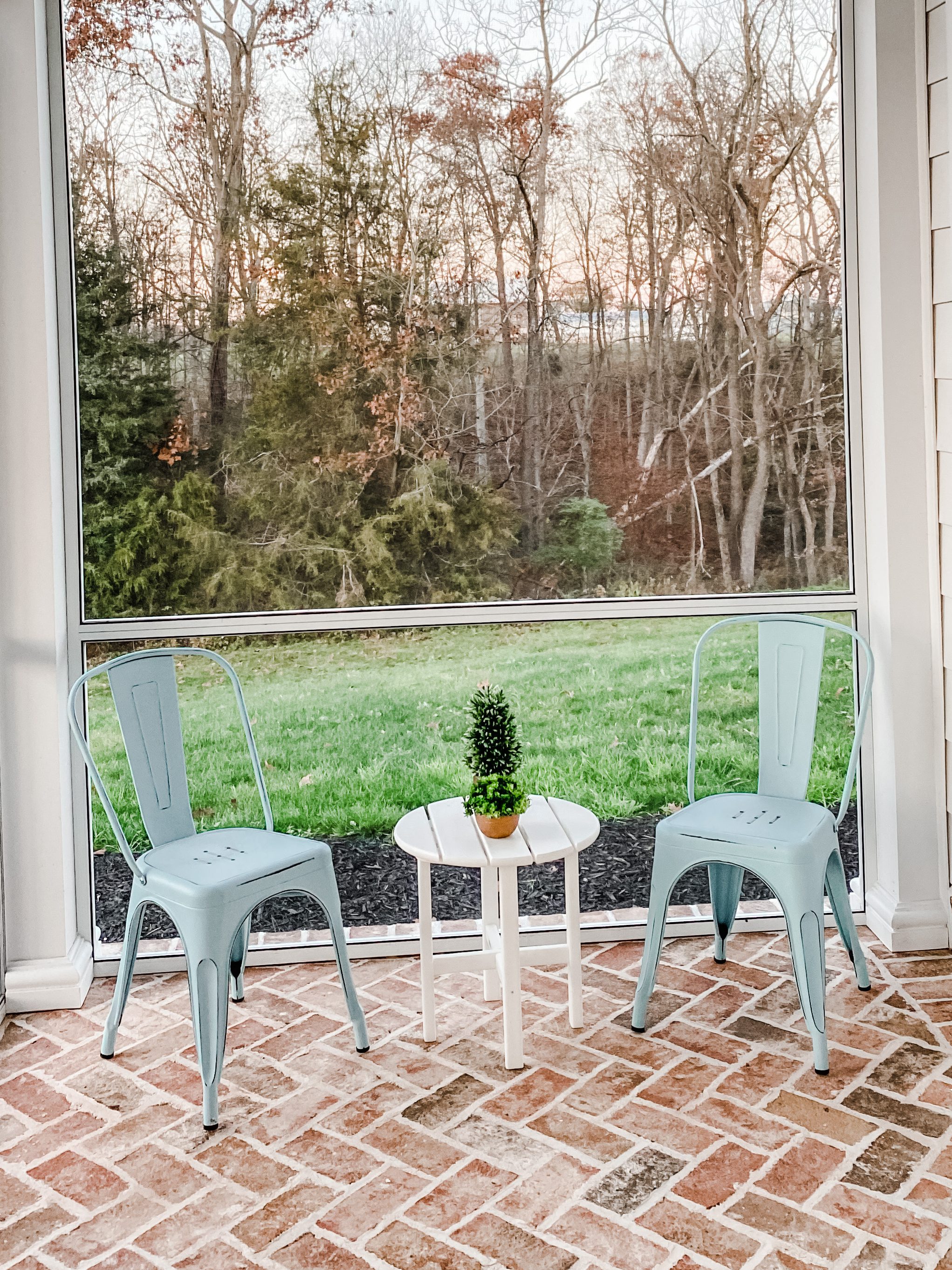 sside table with metal chairs