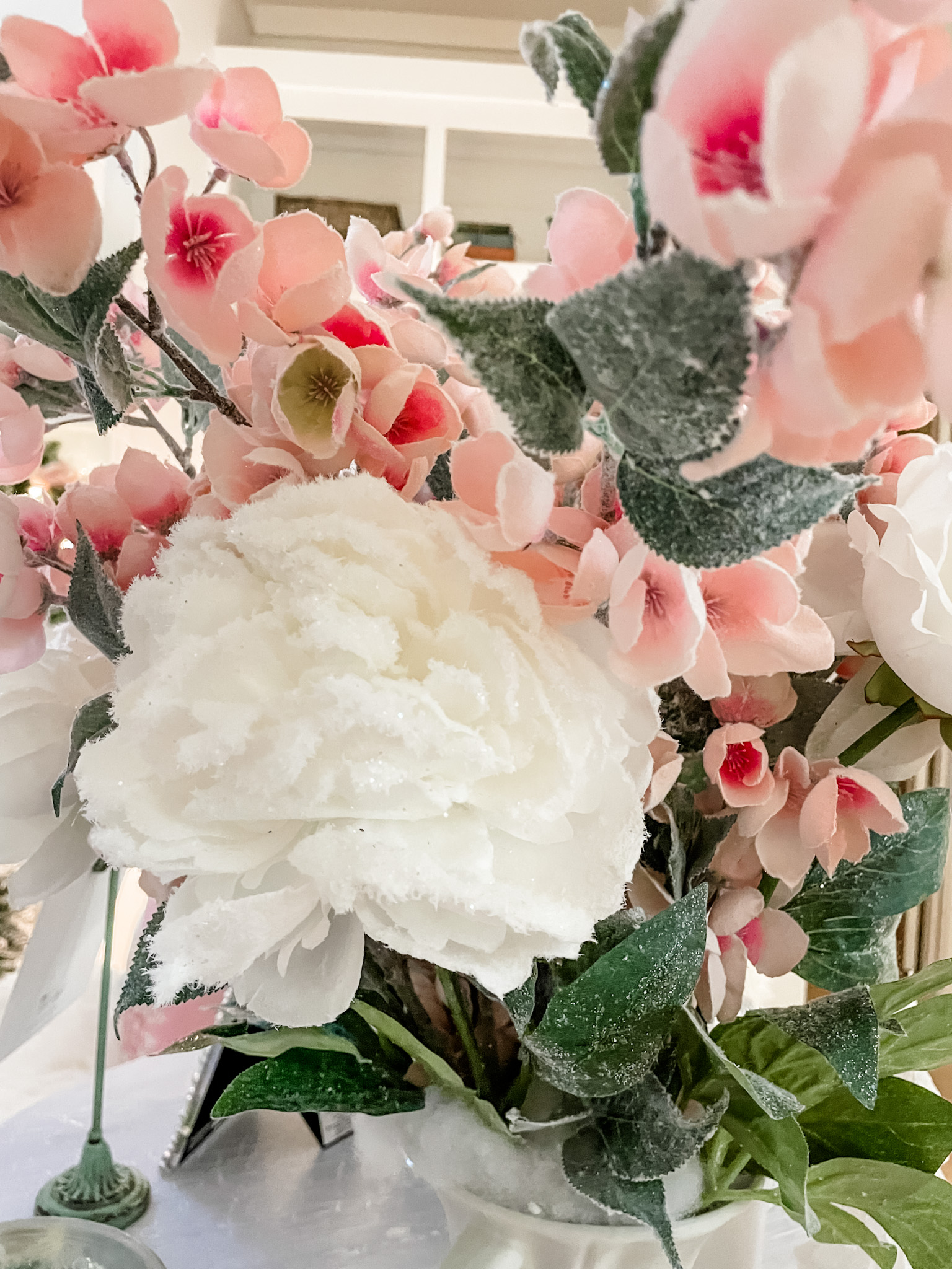 pink and white winter floral arrangement 