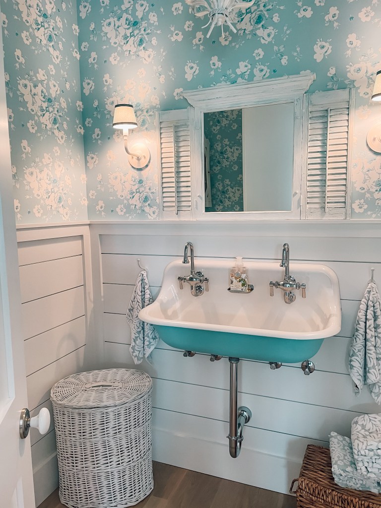 blue powder room in a four gables house plan