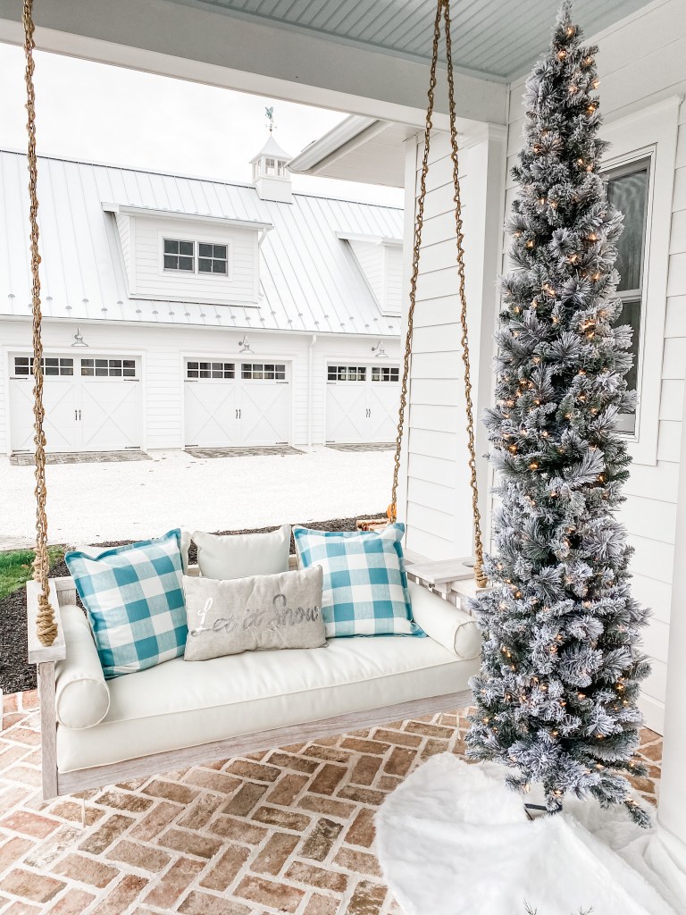 front porch swing with Christmas Decorations
