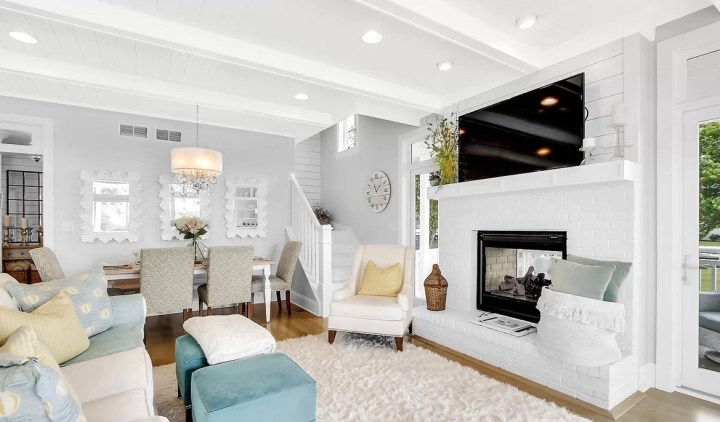 white painted brick fireplace