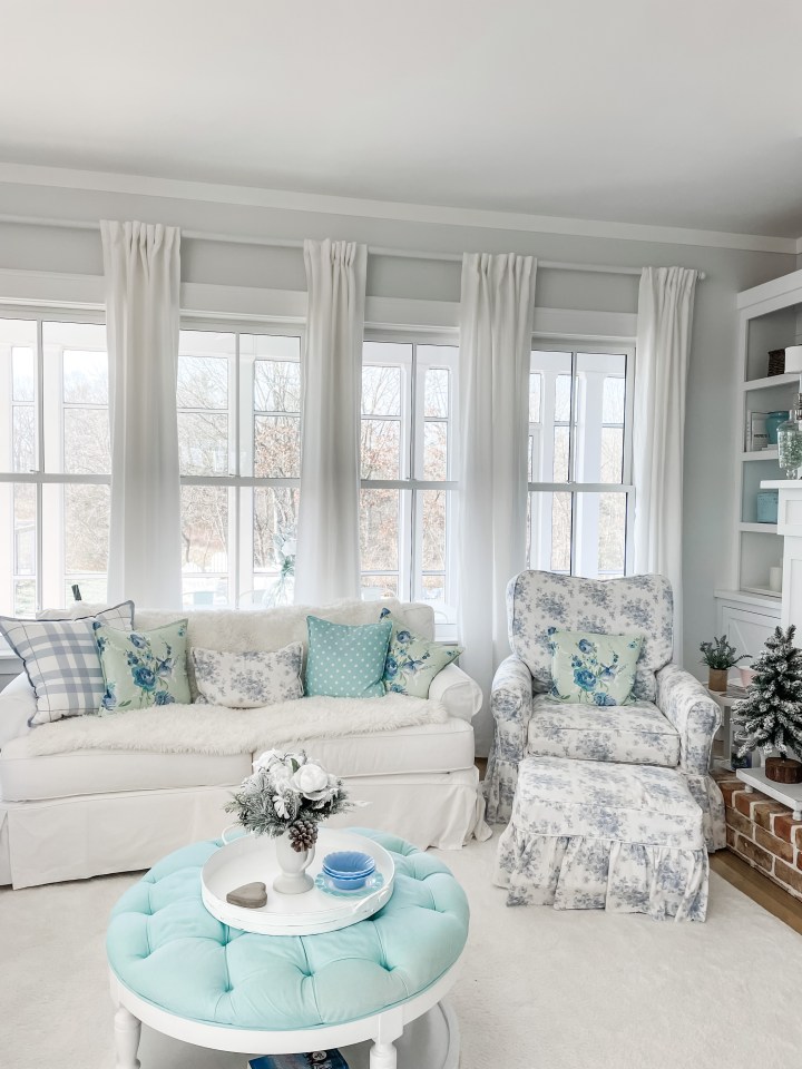 white couch with throw pillows
